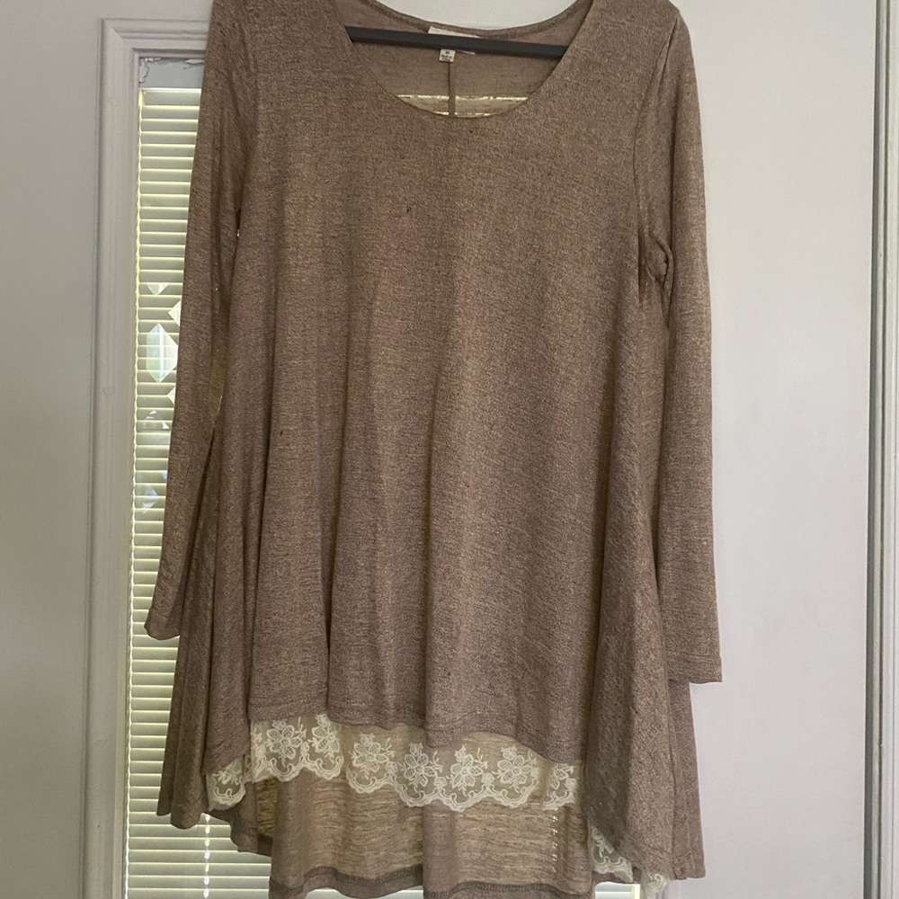 Umgee long sleeve shirt with lace detail at the bottom